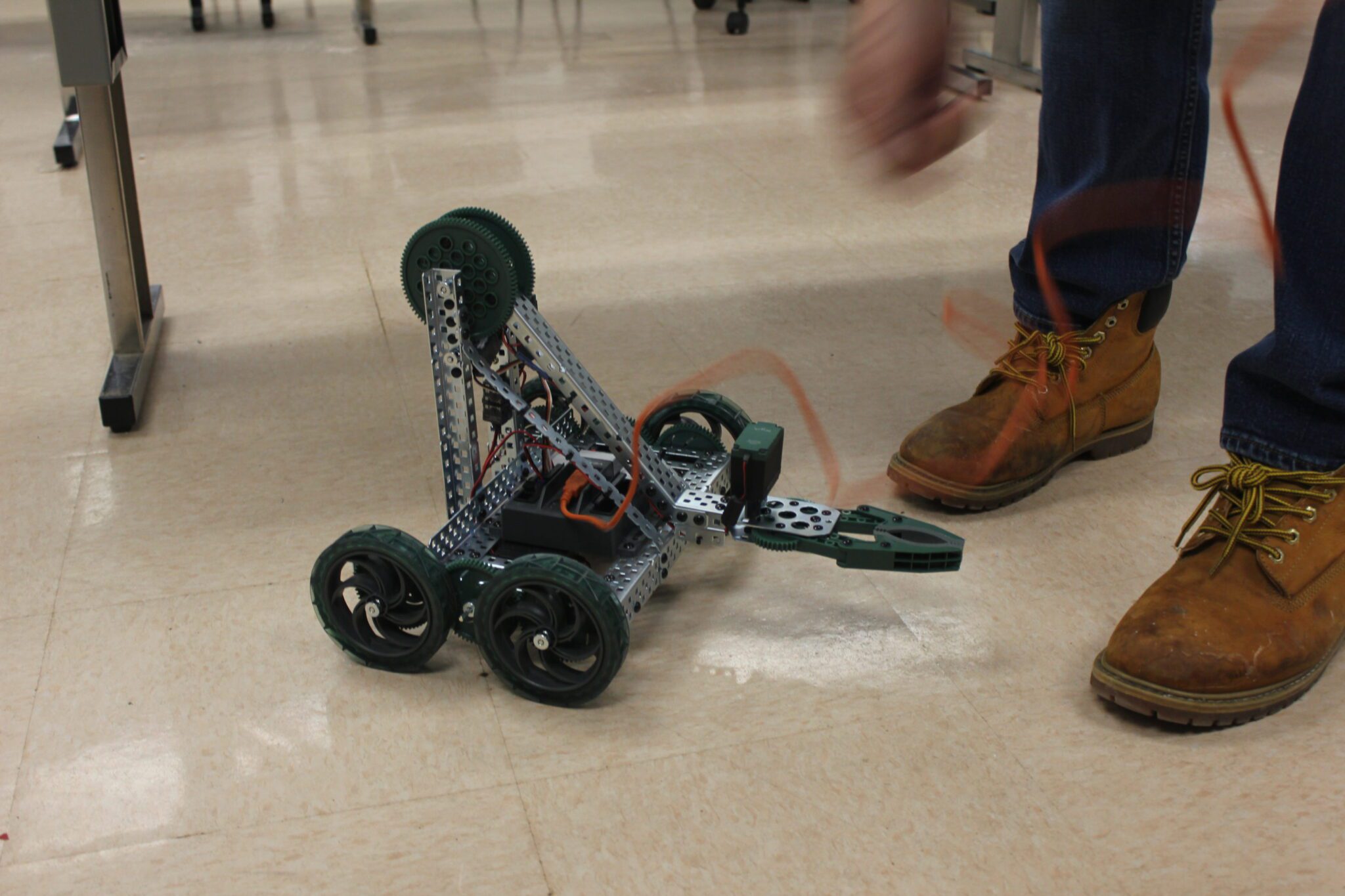 Students testing a robot they built in class.