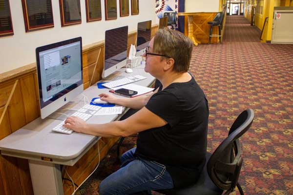 Student registering online for classes.
